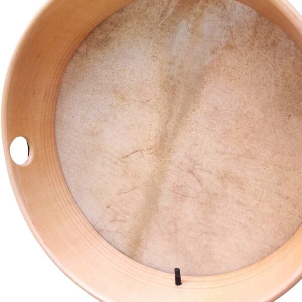 a wooden drum with a hole in it