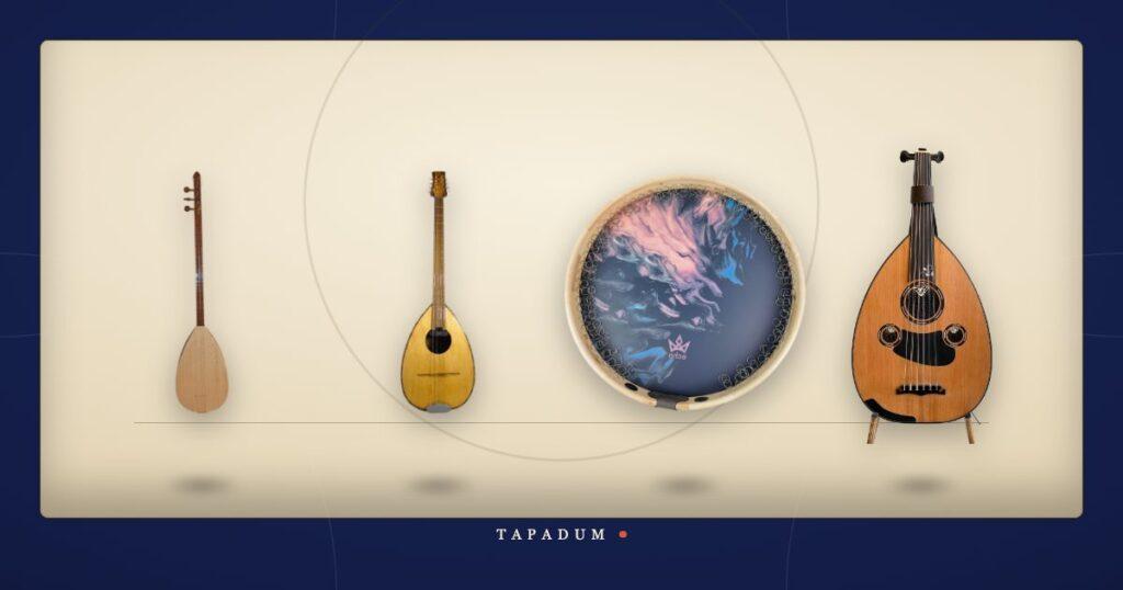 A baglama, bouzouki, frame drum, and oud displayed together, representing the shared instrument families across Turkish, Greek, Arabic, and Persian traditions