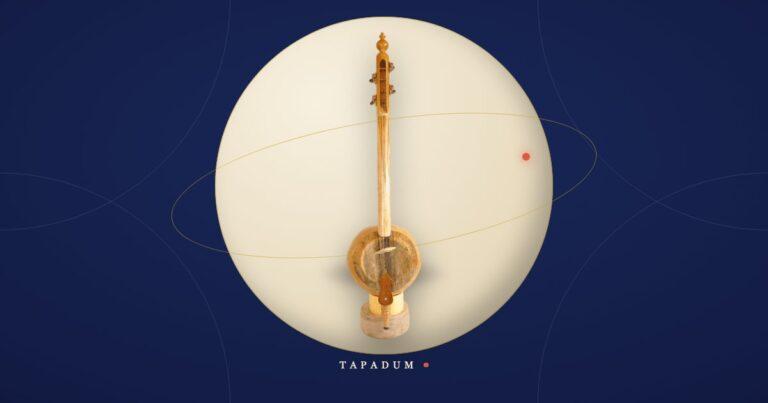 A kabak kemane, the Turkish pumpkin-bodied folk fiddle, standing upright in a glowing circle