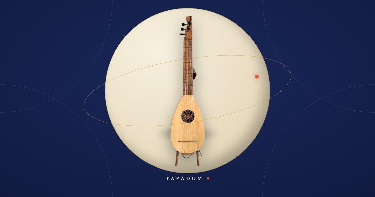 An oğur sazı, Erkan Oğur's modern six-string baglama reinvention, standing in a glowing circle