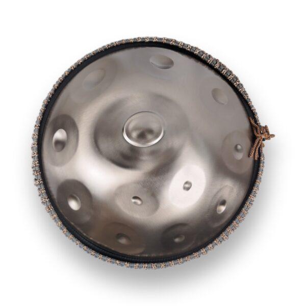 Handpan Tapadum Pro 12 Notes D Kurd Scale – stainless steel top shell with central doum and woven handpan belt